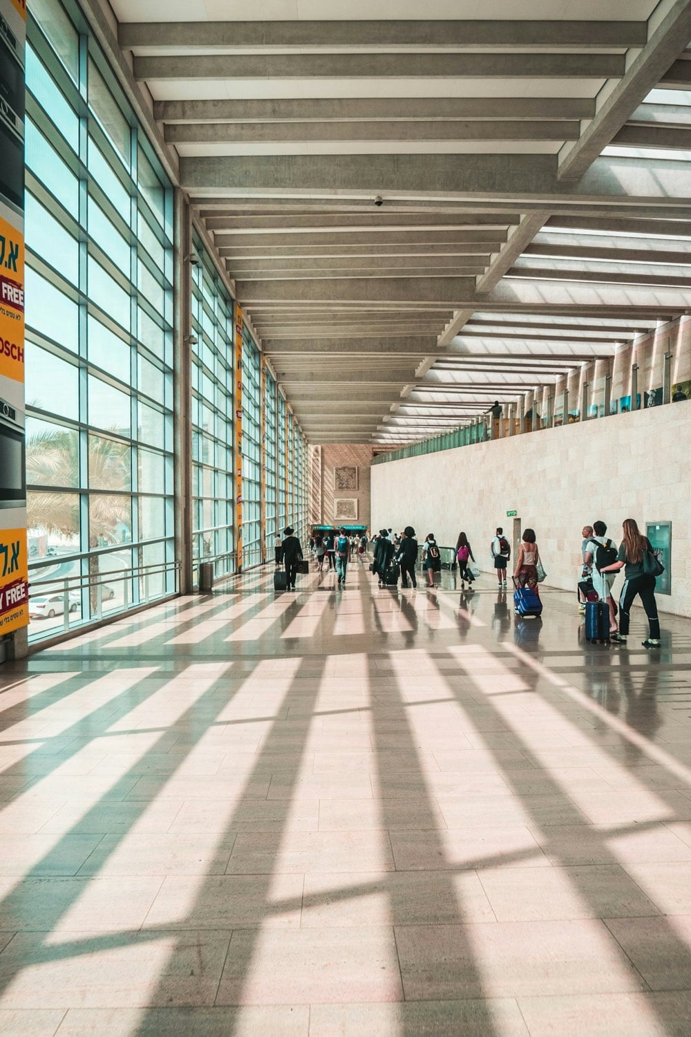 Passengers at an airport departure gate